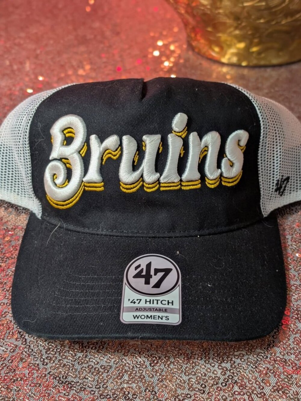 This '47 Brand Boston Bruins Hitch trucker hat features white mesh back panels
